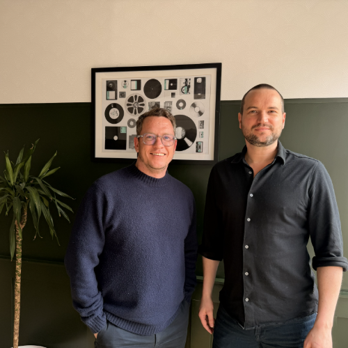 image of two men standing together